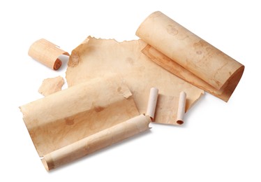 Photo of Sheets of old parchment paper on white background