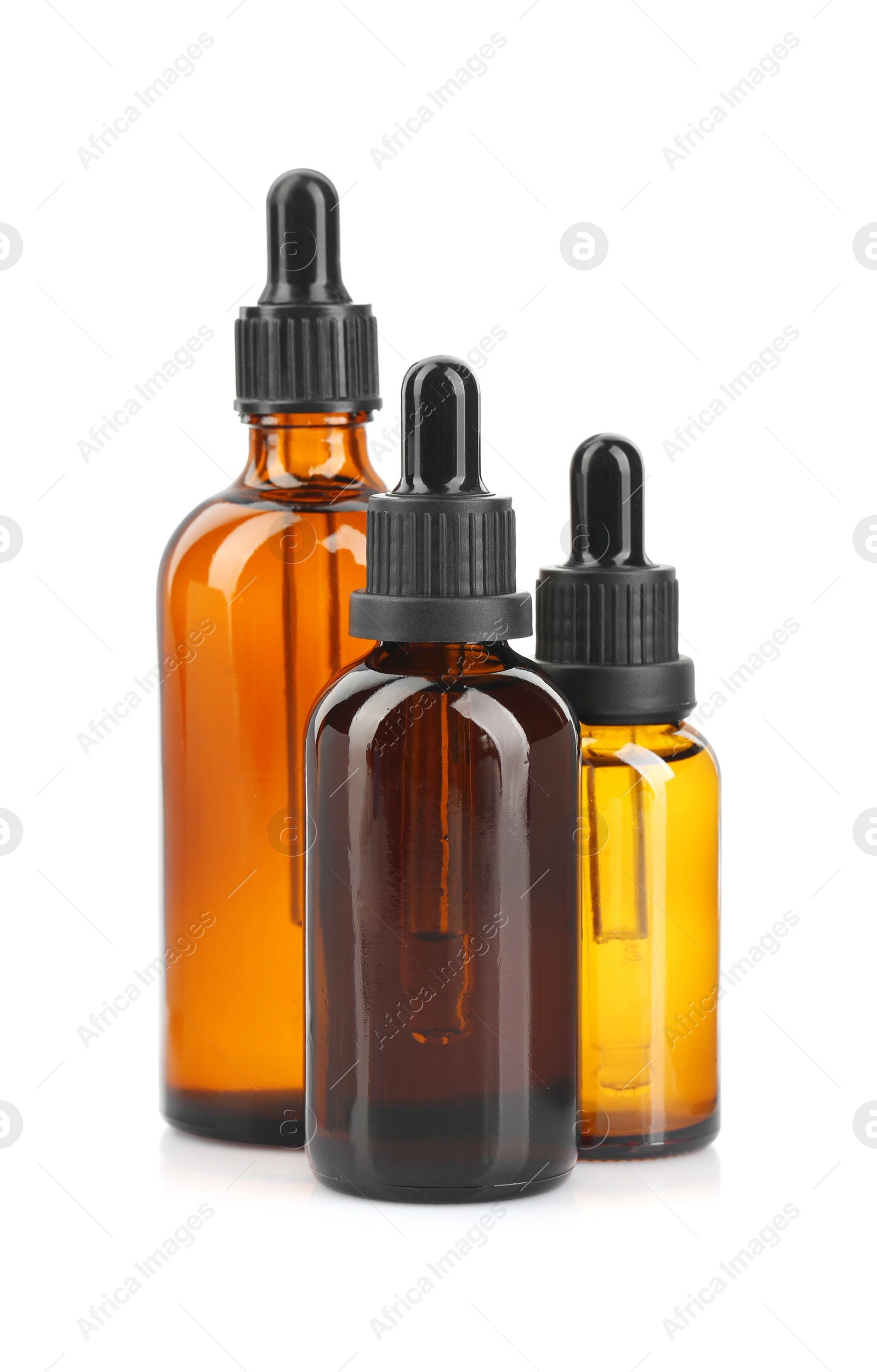 Photo of Glass bottles of tincture isolated on white