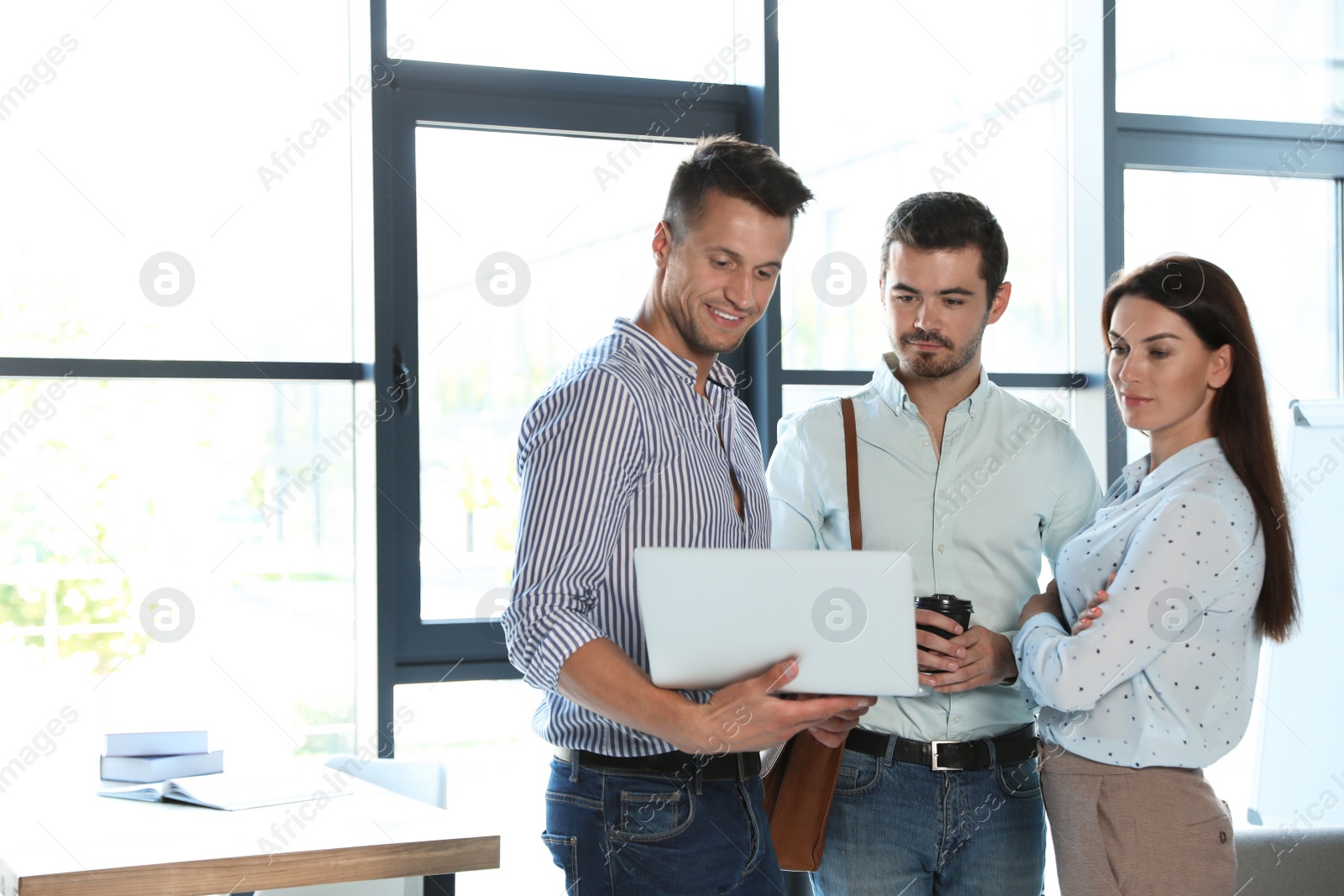 Photo of Office employees having business training at workplace