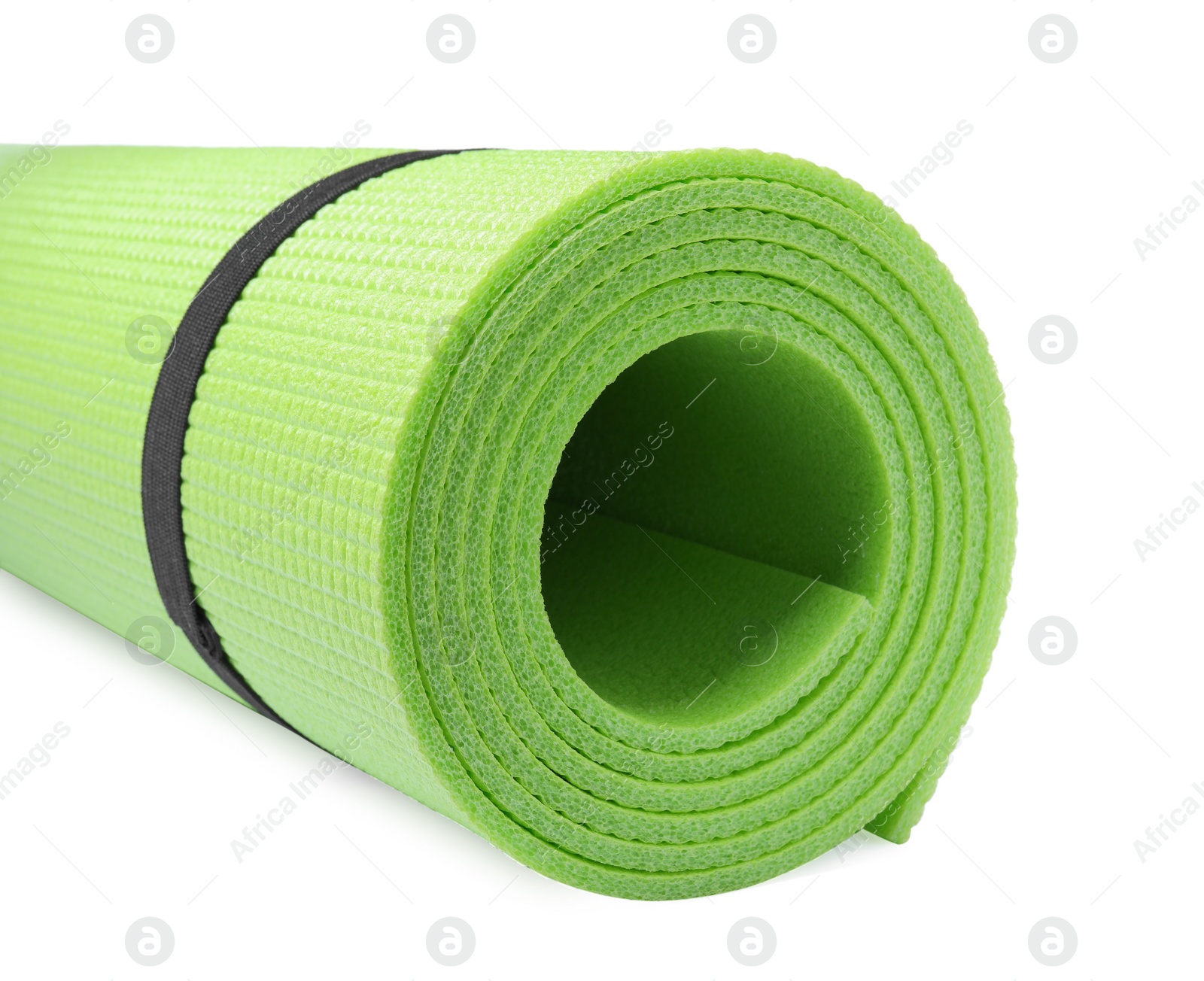 Photo of Rolled camping mat on white background, closeup