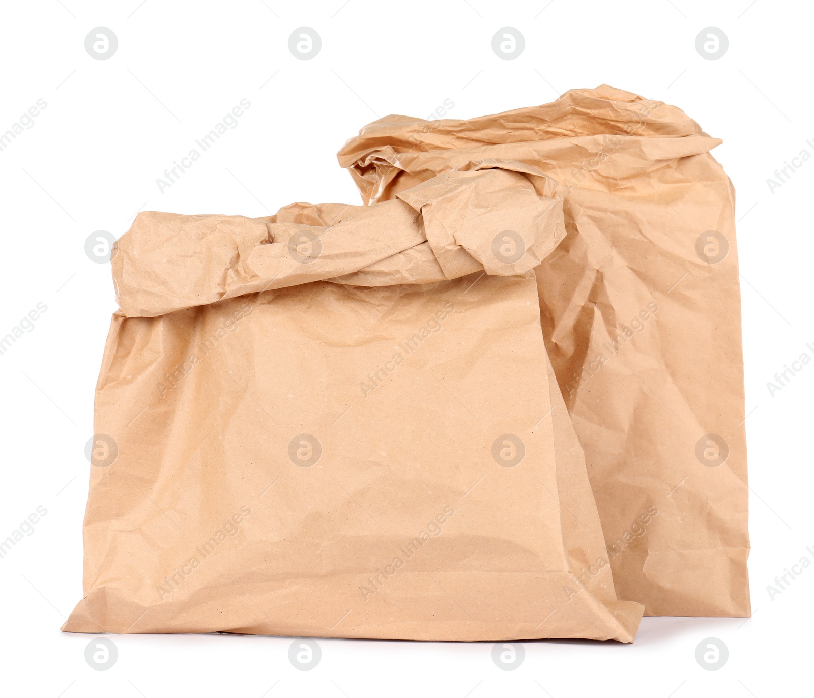 Photo of Paper bags isolated on white. Mockup for design