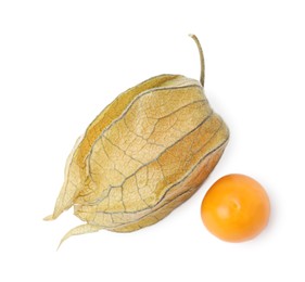 Photo of Fresh ripe physalis fruits isolated on white, top view
