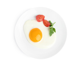 Photo of Tasty fried egg with parsley and tomato isolated on white, top view