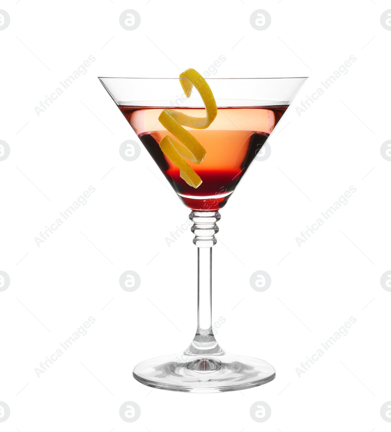 Photo of Glass of martini cocktail with lemon zest on white background