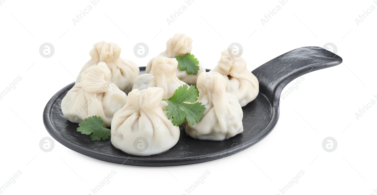 Photo of Serving board with tasty fresh khinkali (dumplings) and parsley isolated on white. Georgian cuisine