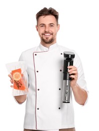 Photo of Chef holding sous vide cooker and salmon in vacuum pack on white background