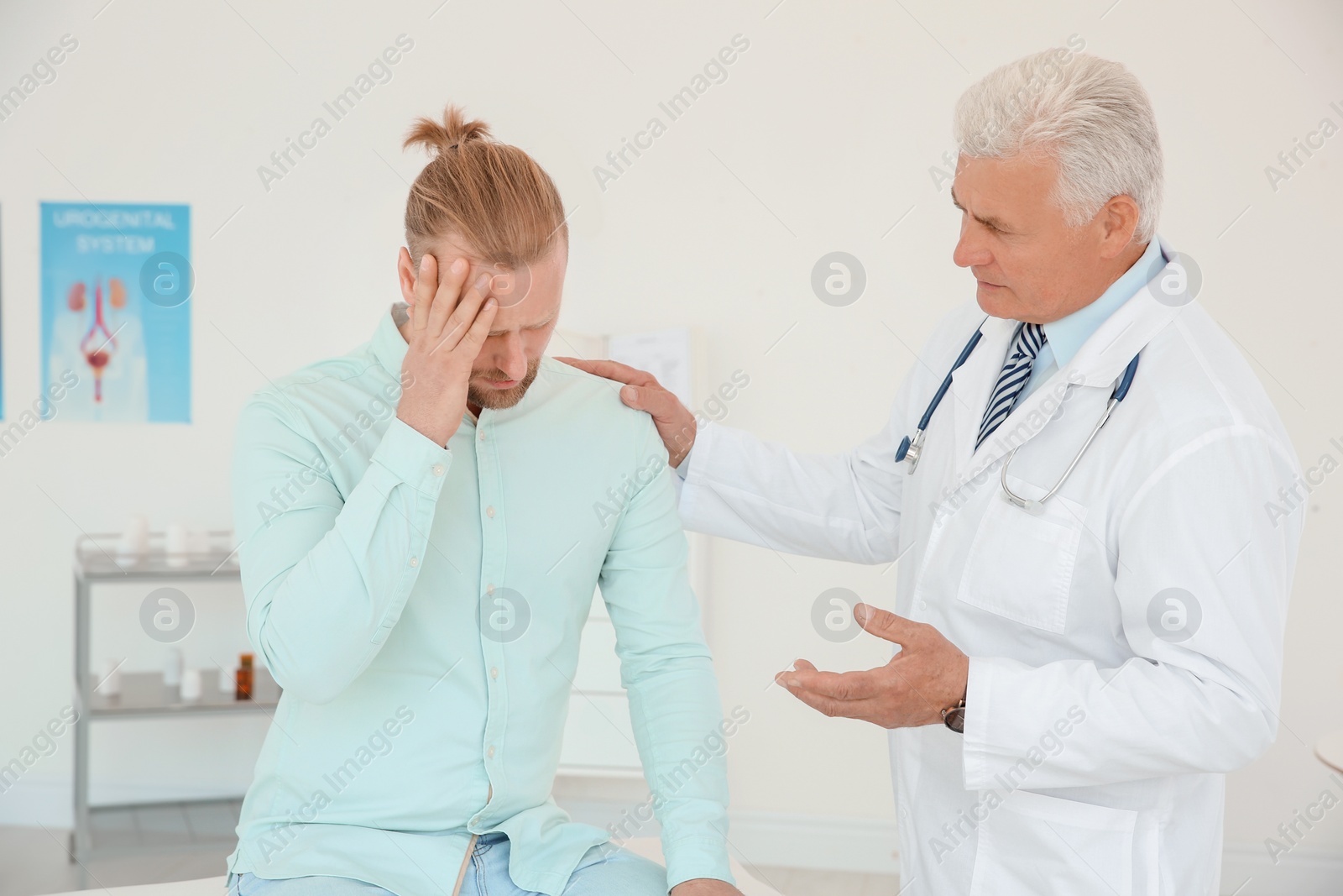 Photo of Man with health problems visiting urologist at hospital