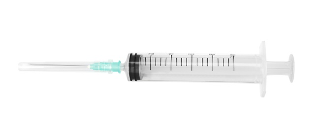 Plastic syringe on white background. Medical instrument