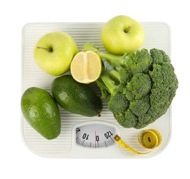 Photo of Healthy diet. Scale with products and measuring tape isolated on white, top view