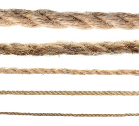 Set of hemp ropes on white background