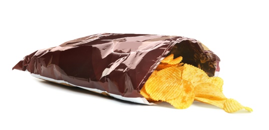 Bag with crispy potato chips on white background