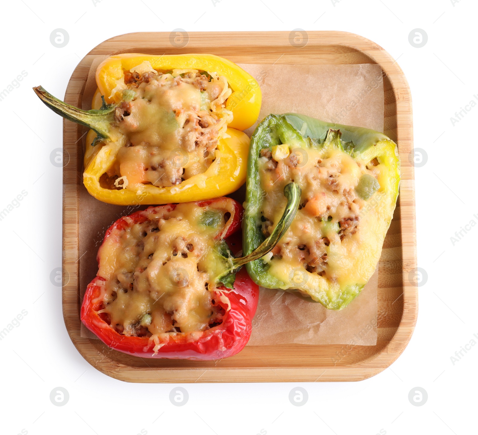 Photo of Tasty stuffed bell peppers isolated on white, top view