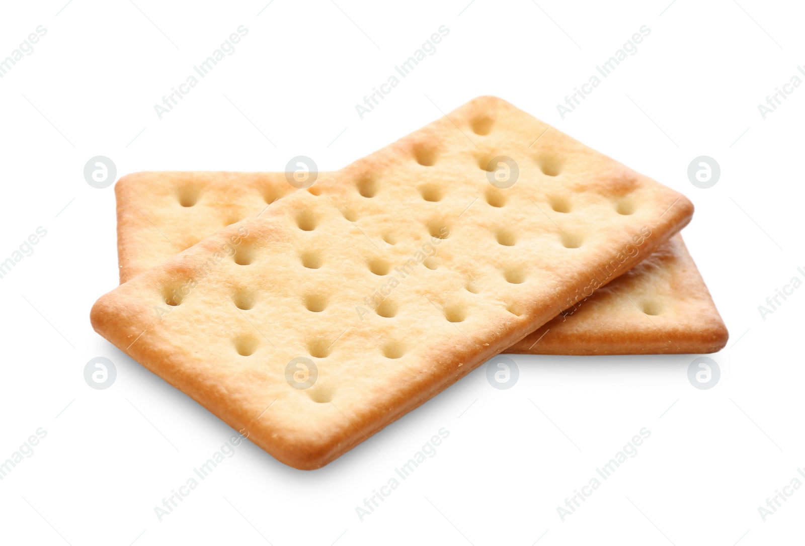 Photo of Crispy crackers isolated on white. Delicious snack