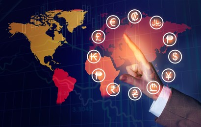 Image of Money exchange. Man using virtual screen with world map and different currency symbols, double exposure