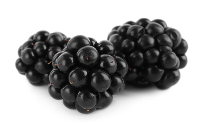 Photo of Beautiful tasty ripe blackberries on white background