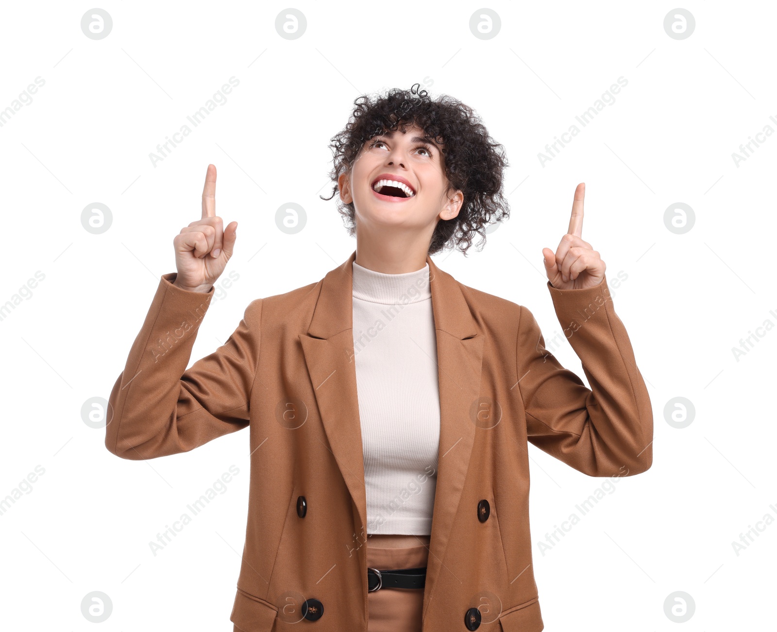 Photo of Beautiful happy businesswoman pointing at something on white background