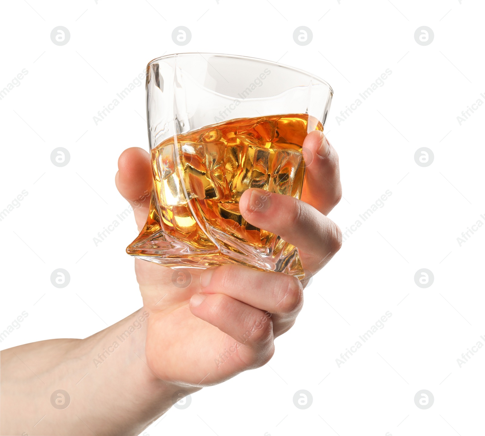 Photo of Man holding glass of whiskey with ice cubes on white background, closeup