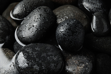 Pile of stones in water as background, closeup. Zen lifestyle