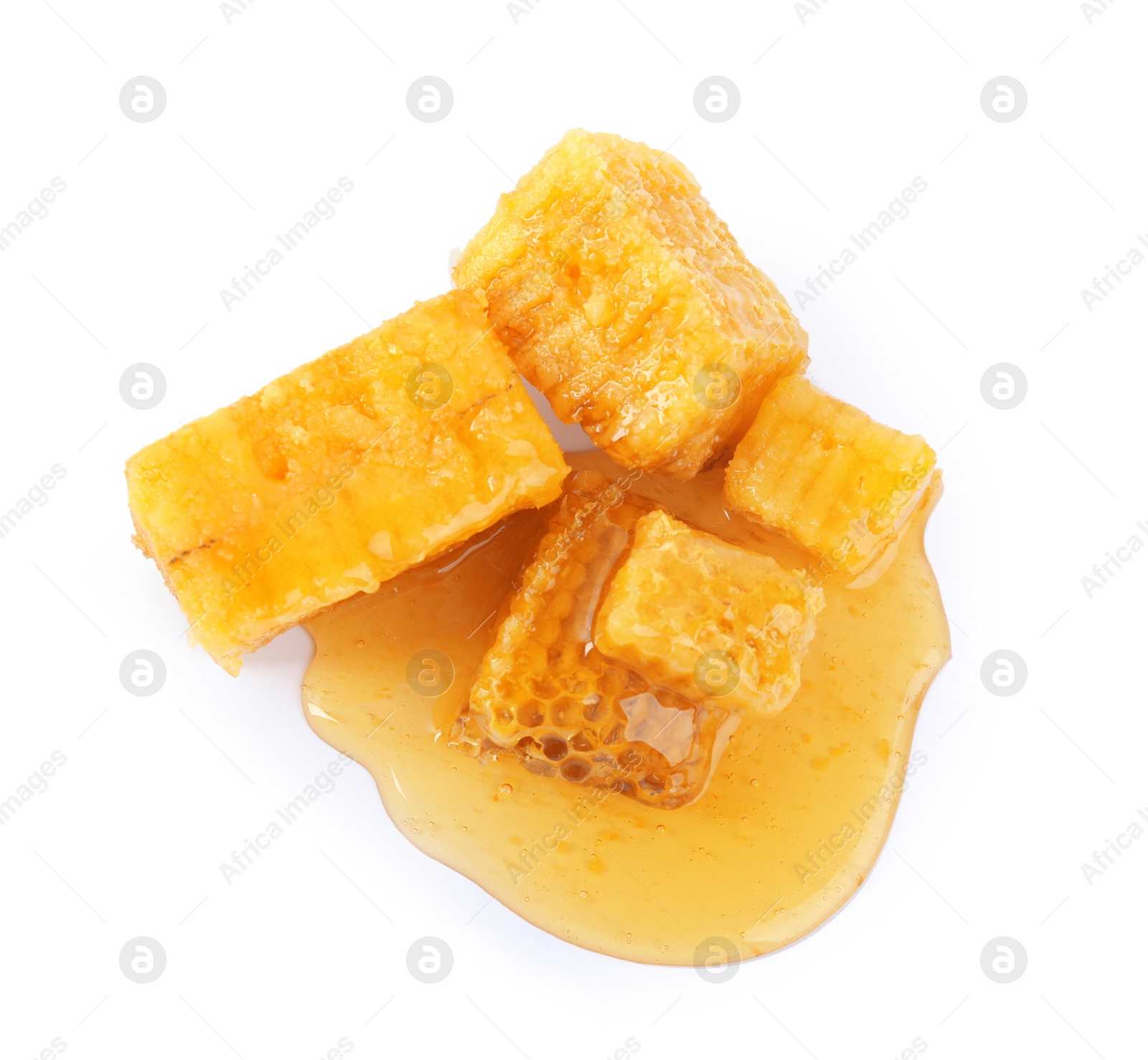 Photo of Pieces of tasty fresh honeycomb isolated on white, top view