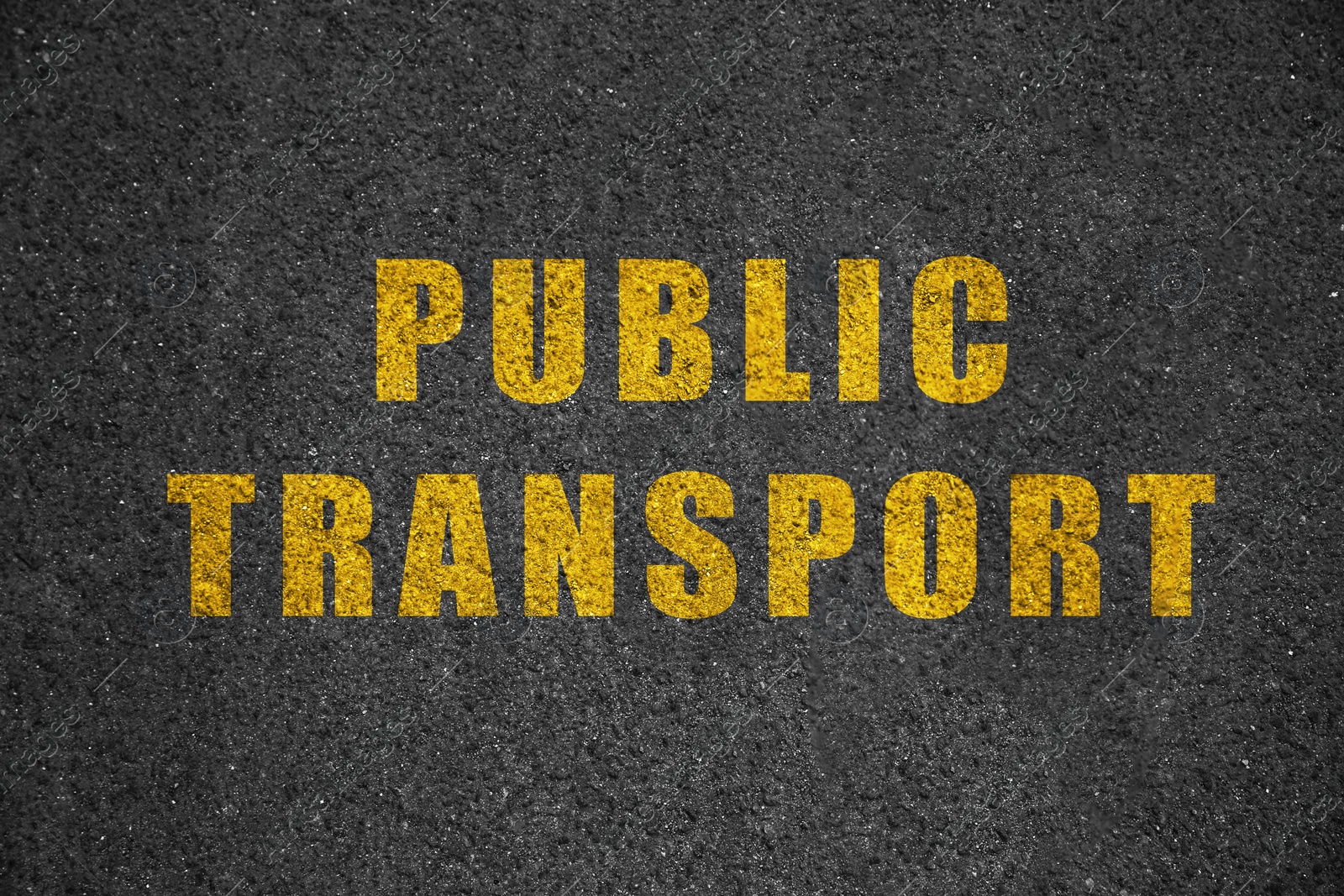 Image of Text PUBLIC TRANSPORT written on asphalt road, top view