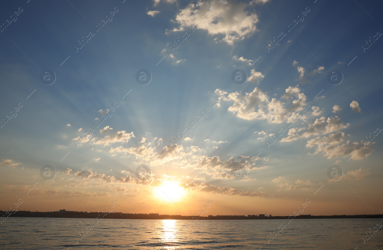 Photo of Picturesque view of beautiful sunrise on riverside. Morning sky