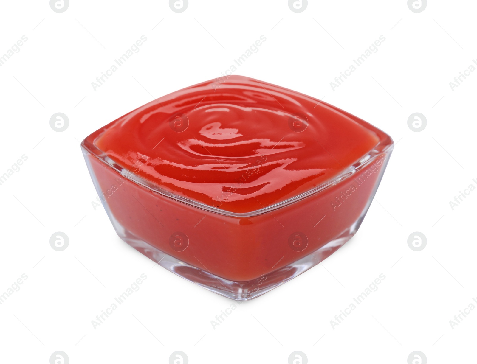 Glass bowl of tasty ketchup isolated on white. Tomato sauce Photo of Glass bowl of tasty ketchup isolated on white. Tomato sauce