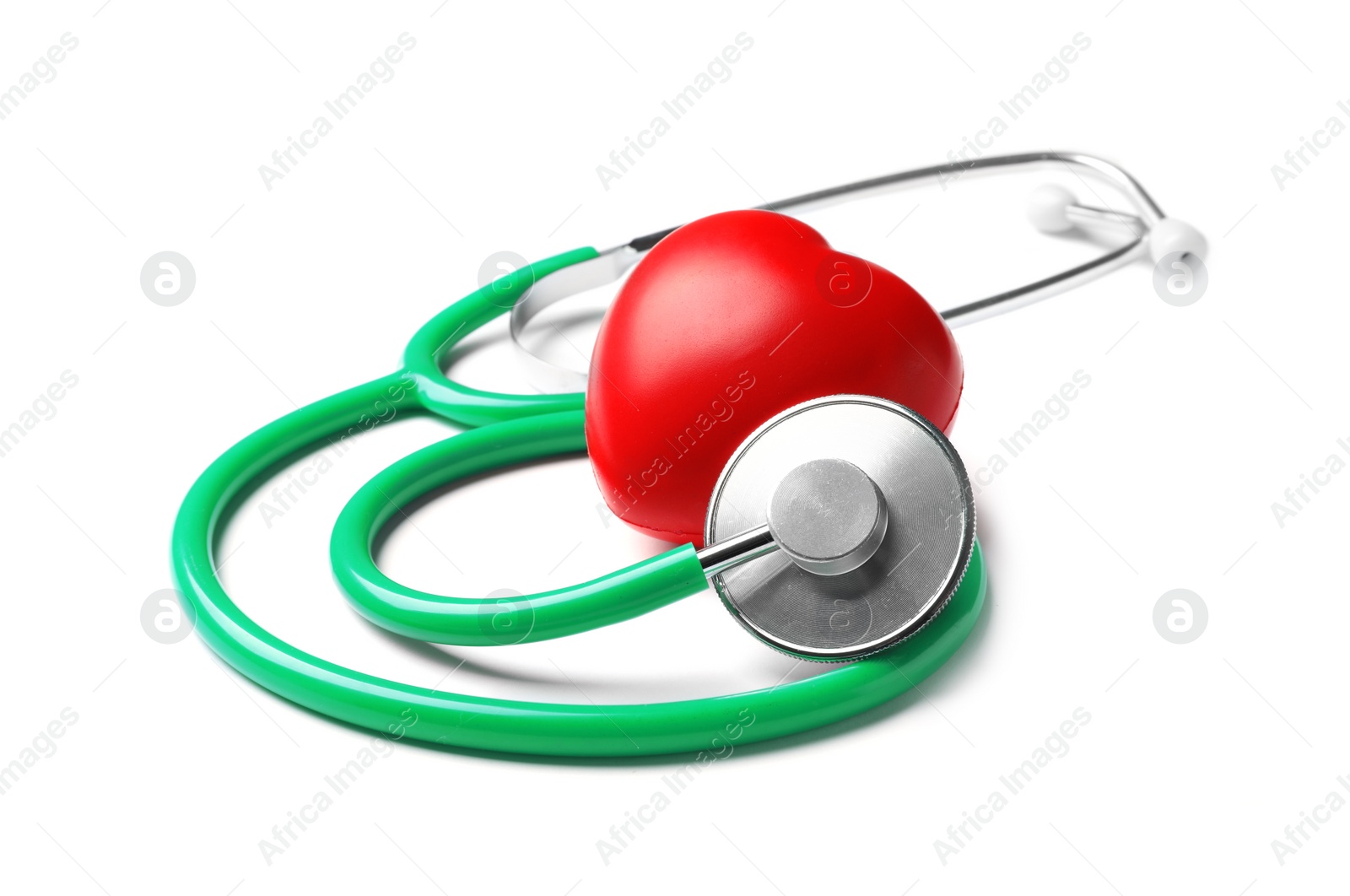 Photo of Stethoscope for checking pulse and red heart on white background