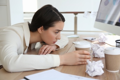 Businesswoman stressing out at workplace in office