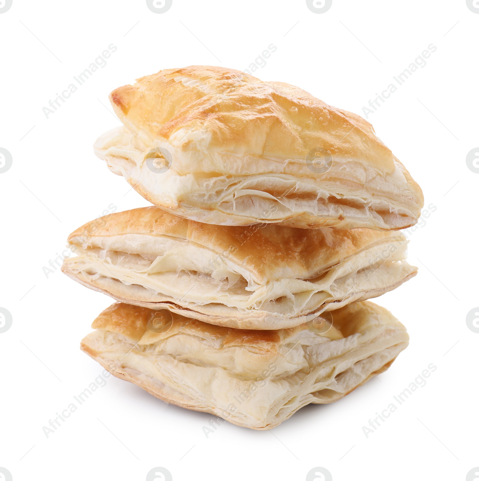 Photo of Stack of delicious fresh puff pastries isolated on white