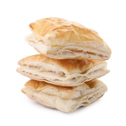 Photo of Stack of delicious fresh puff pastries isolated on white