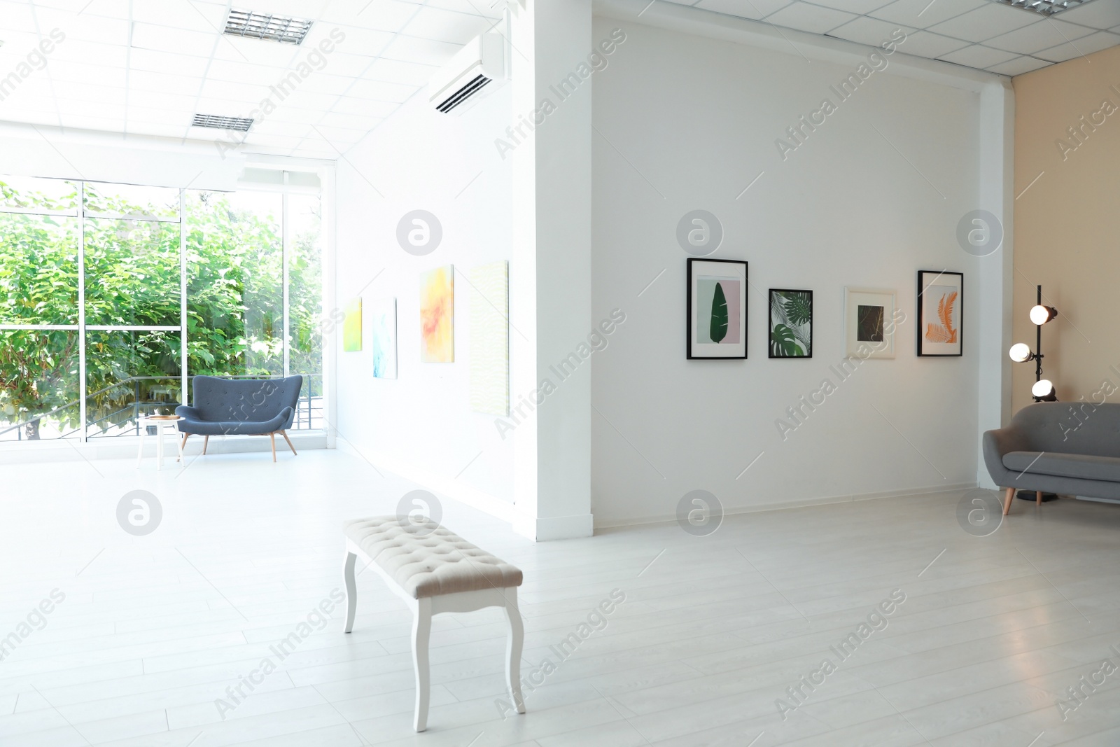 Photo of Empty hall of modern art gallery with exhibits