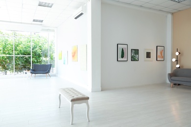 Empty hall of modern art gallery with exhibits