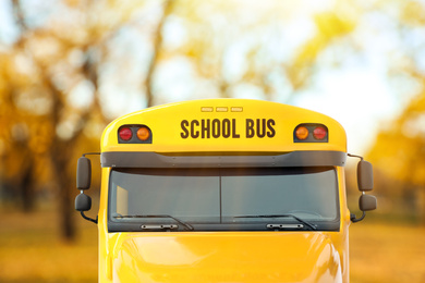 Image of Yellow school bus outdoors. Transport for students