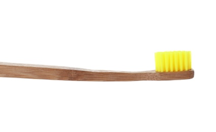 Bamboo toothbrush on white background. Dental care