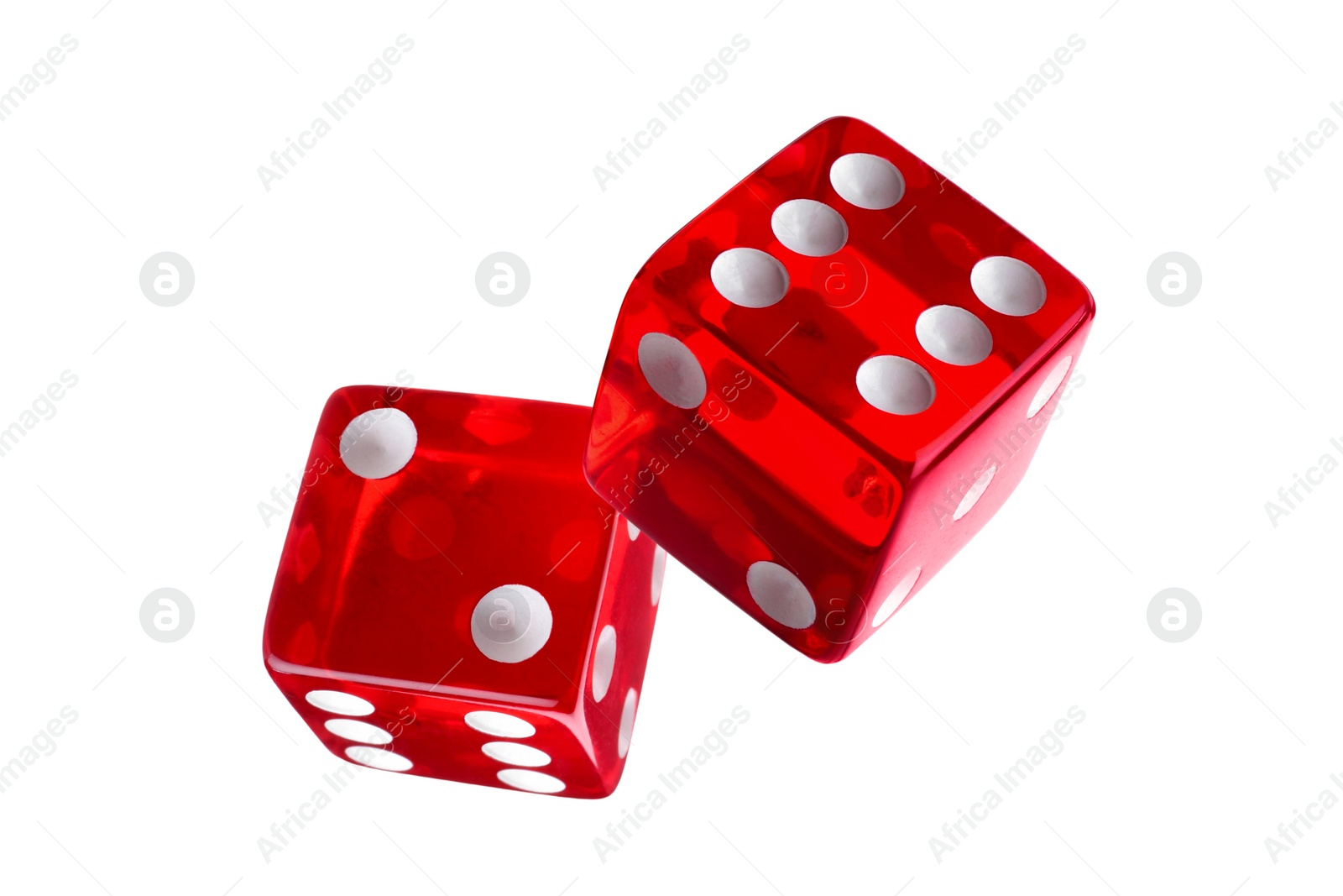 Image of Two red dice in air on white background