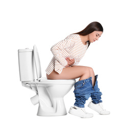 Photo of Woman with stomach ache sitting on toilet bowl, white background