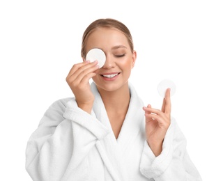 Photo of Beautiful young woman with cotton pads on white background