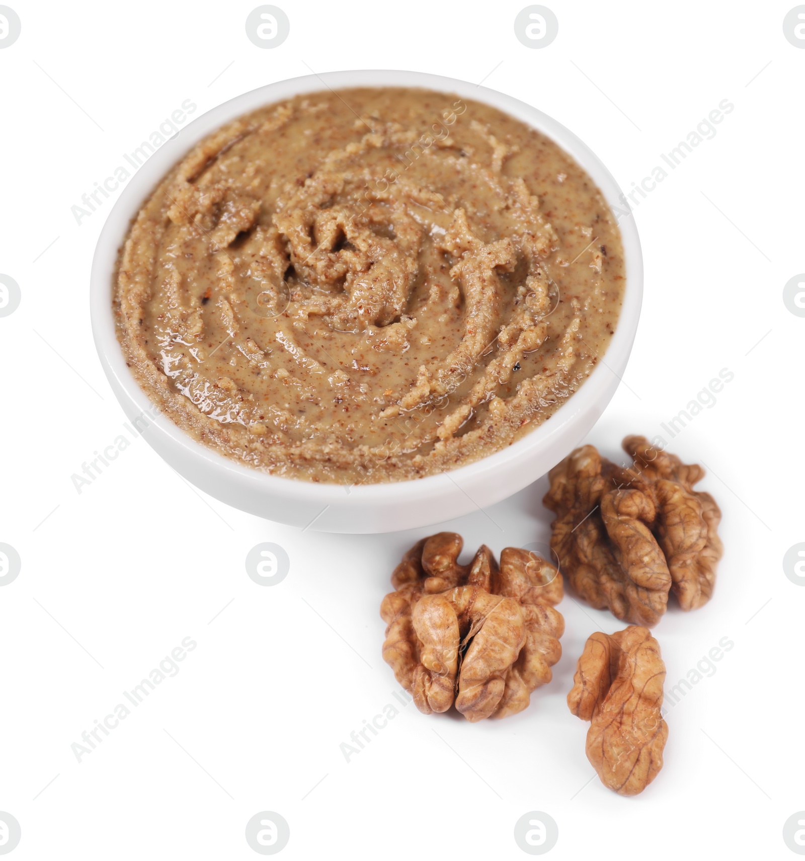 Photo of Delicious nut butter and walnuts isolated on white