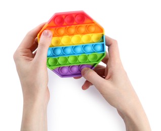 Woman using pop it fidget toy on white background, closeup