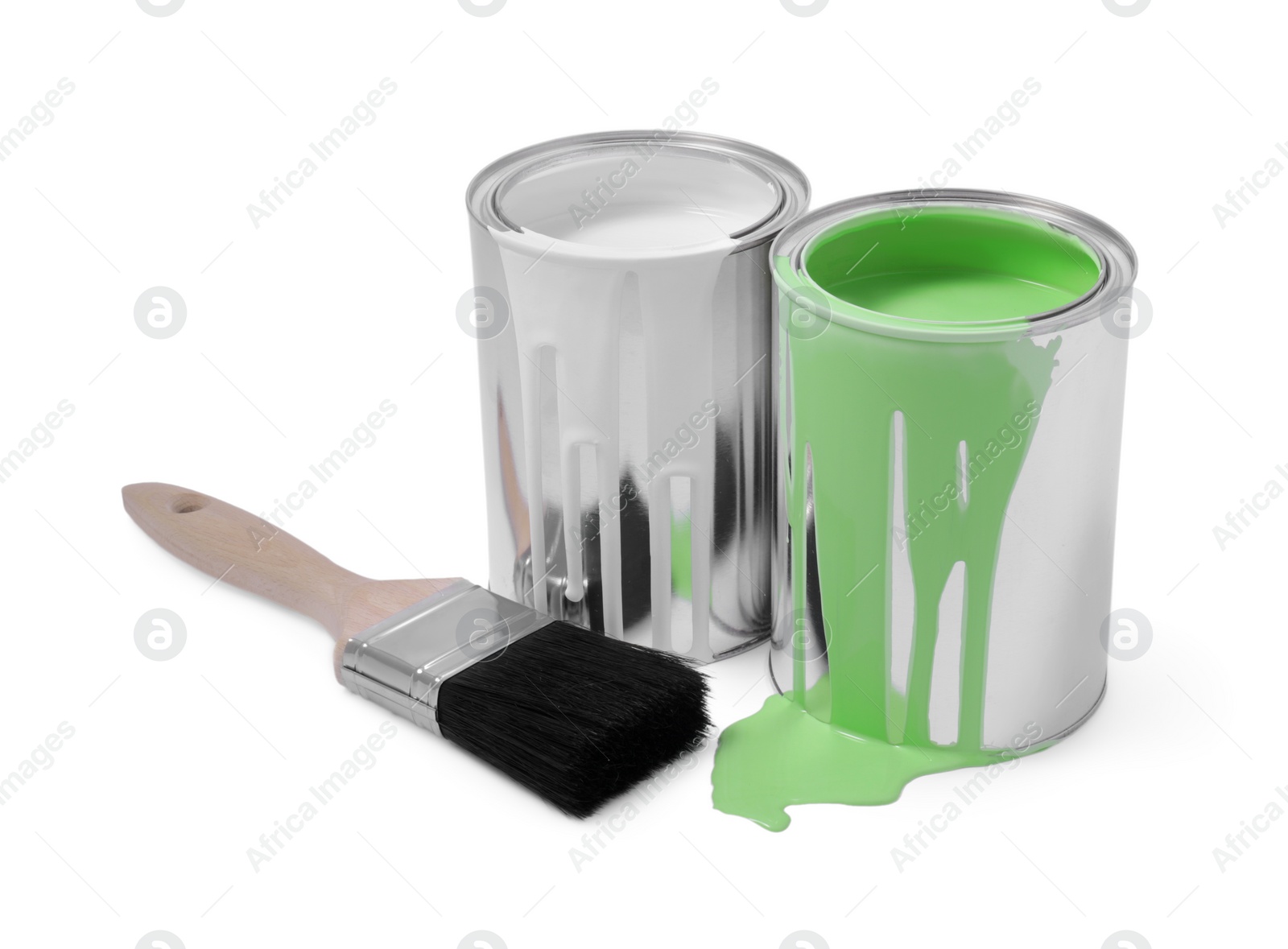 Photo of Cans of paints and brush isolated on white