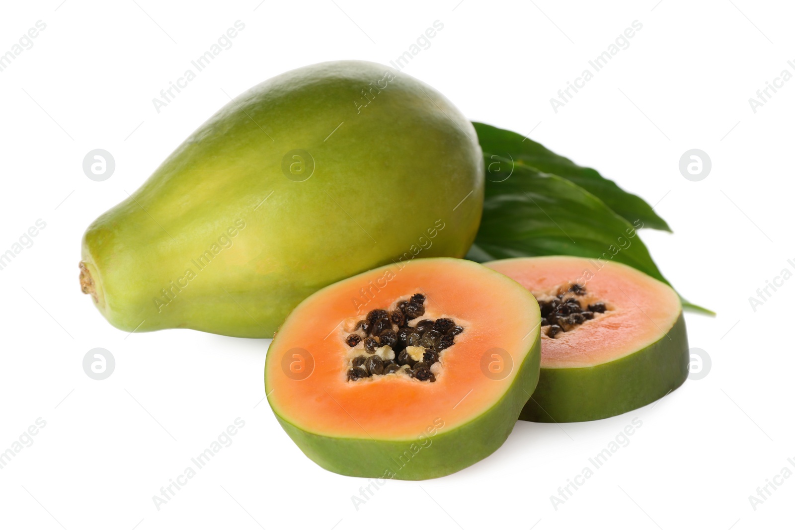 Photo of Fresh ripe papaya fruits with green leaves on white background