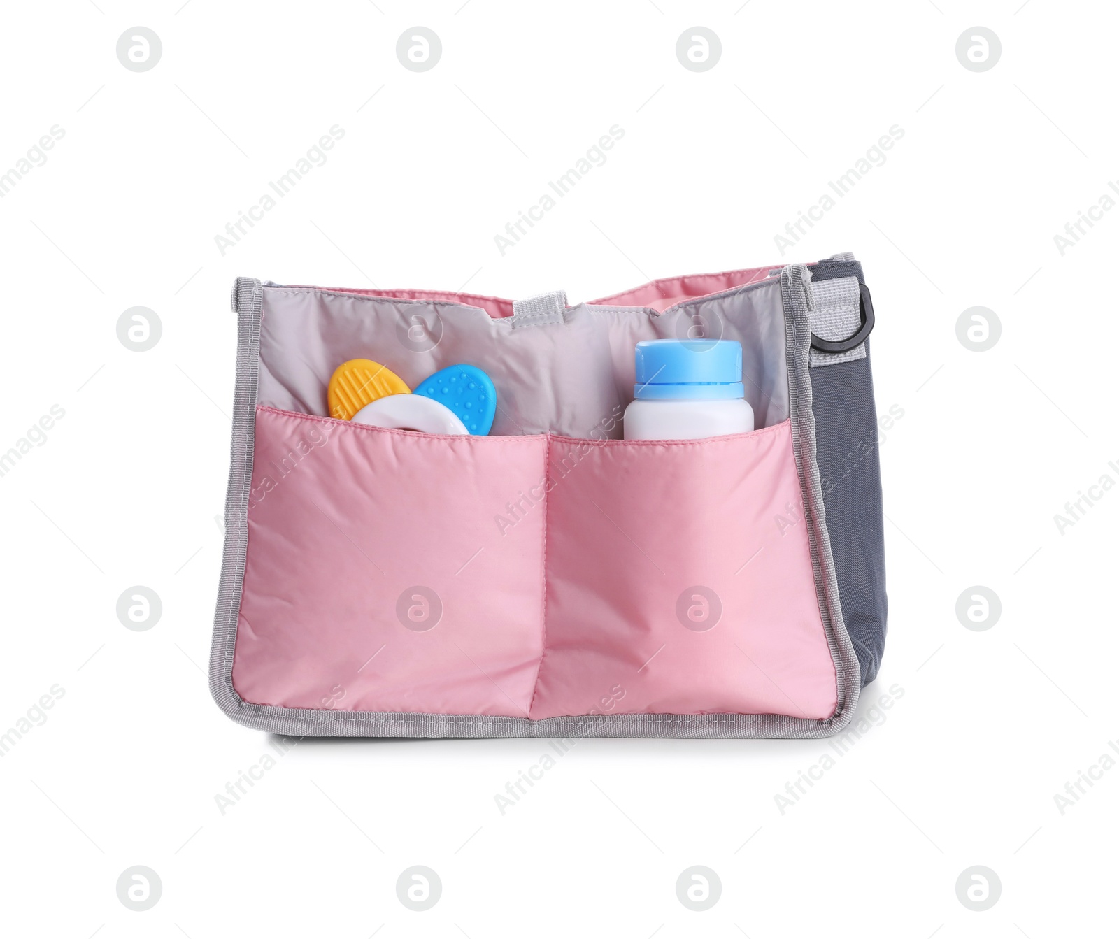 Photo of Maternity bag with baby accessories on white background