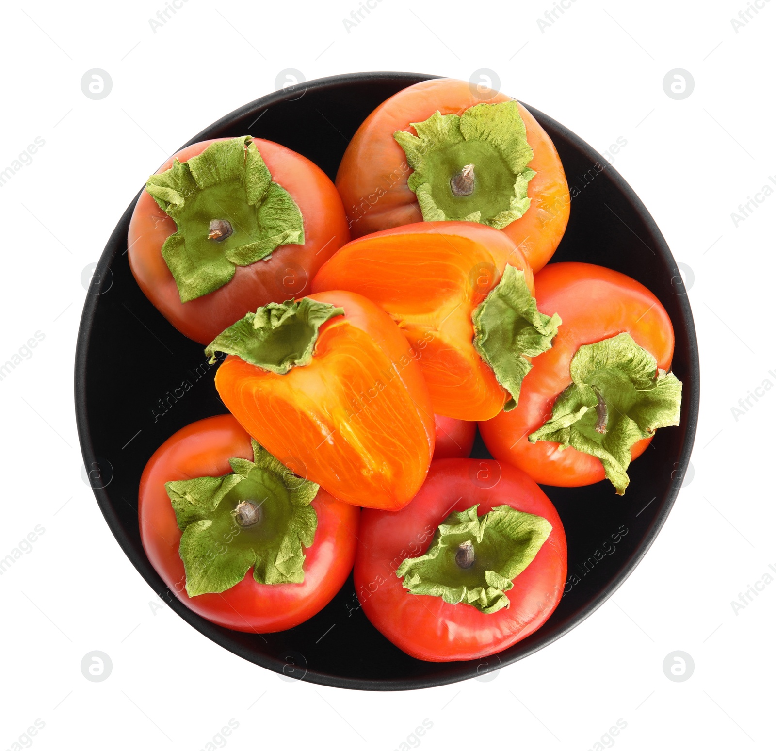 Photo of Bowl with delicious fresh persimmons isolated on white, top view