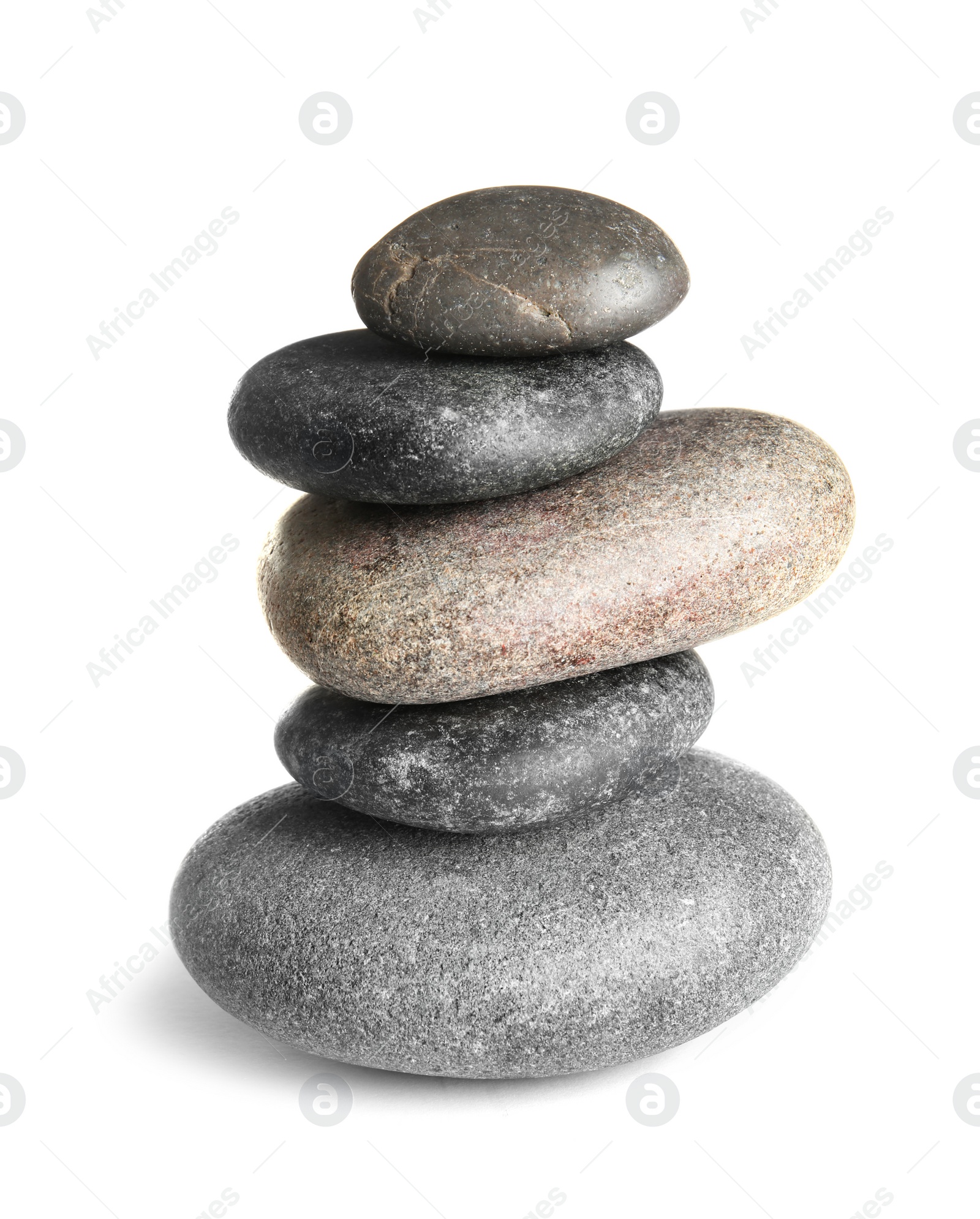 Photo of Stack of zen spa stones on white background