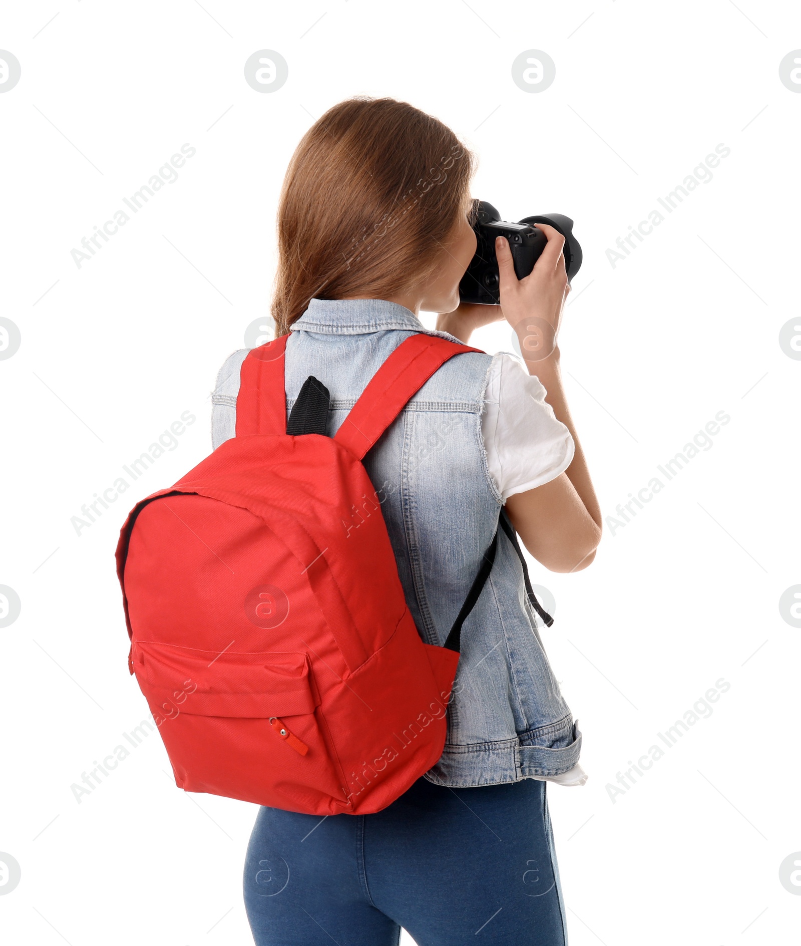 Photo of Female photographer with camera on white background