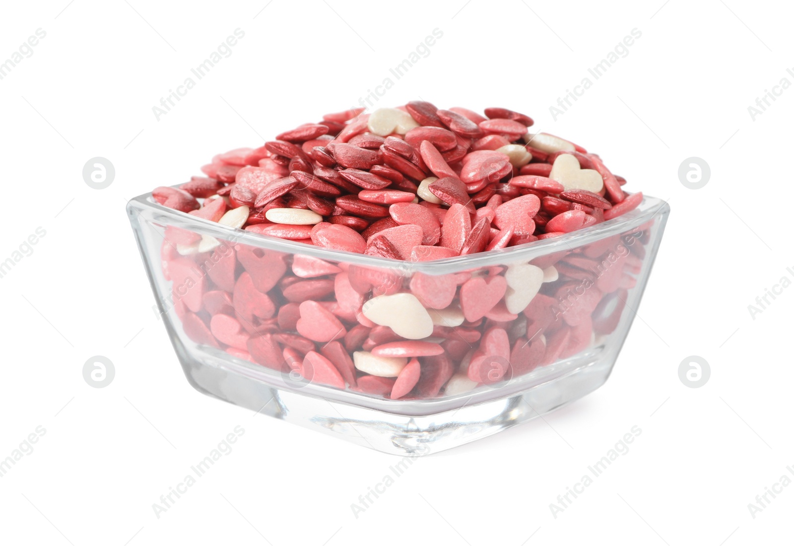 Photo of Bright heart shaped sprinkles in glass bowl isolated on white