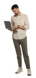 Handsome man working with laptop on white background