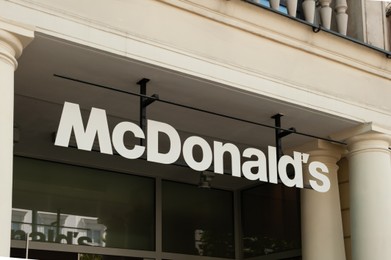 Photo of WARSAW, POLAND - JULY 19, 2022: Signboard with McDonald's Restaurant logo outdoors