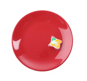 Photo of Red plate with dishwasher detergent pod on white background, top view