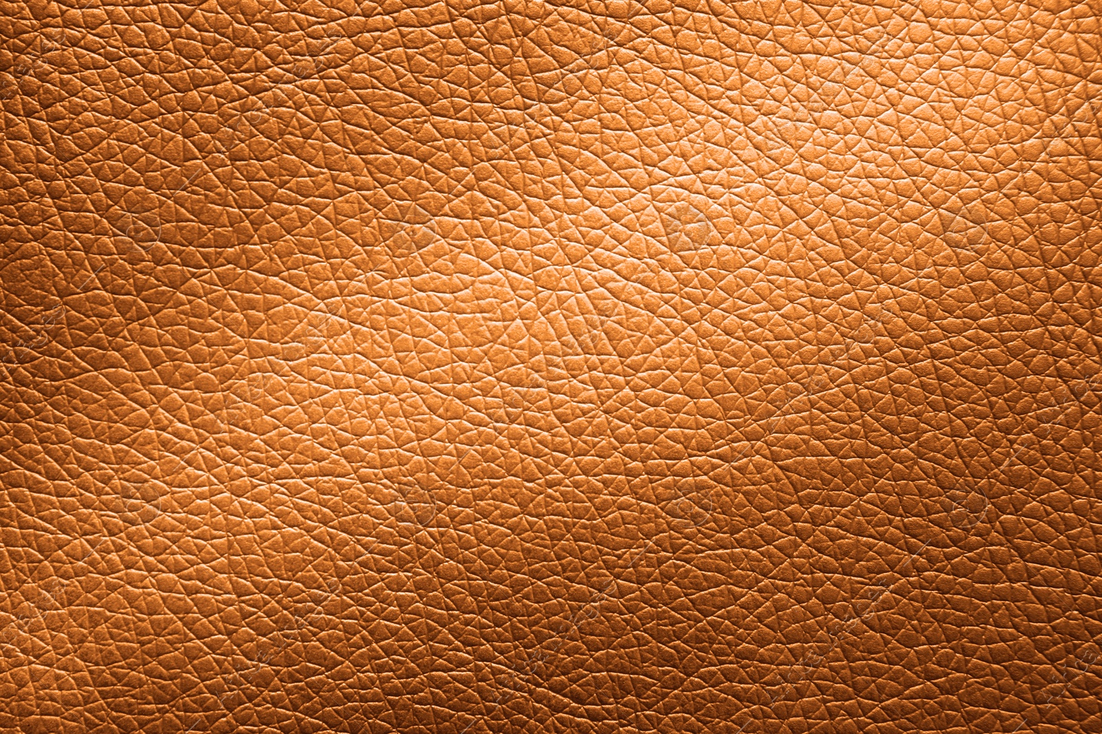 Image of Golden textured surface as background, closeup view